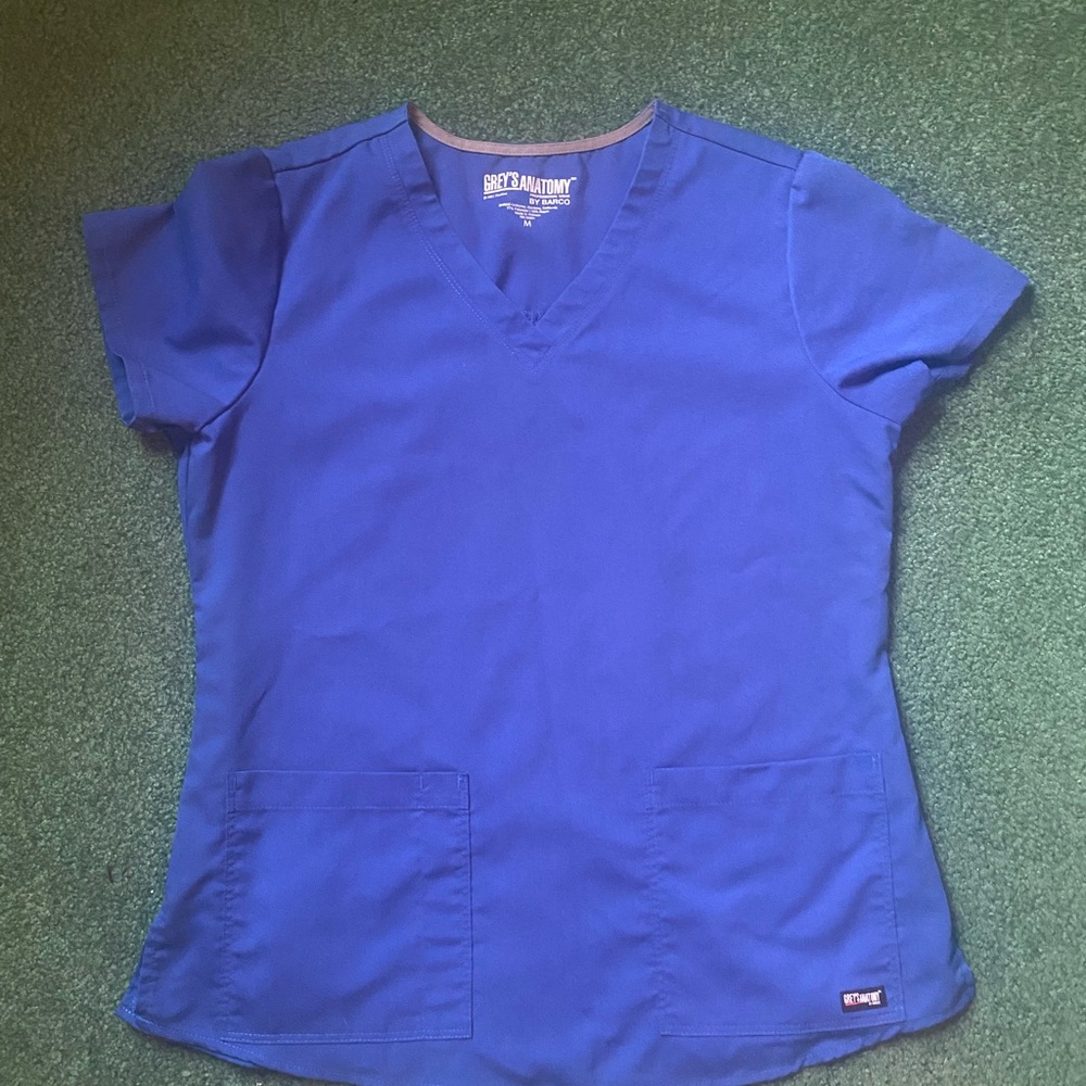 Greys anatomy total blue gently used scrubs. Wore 3 times. Size medium